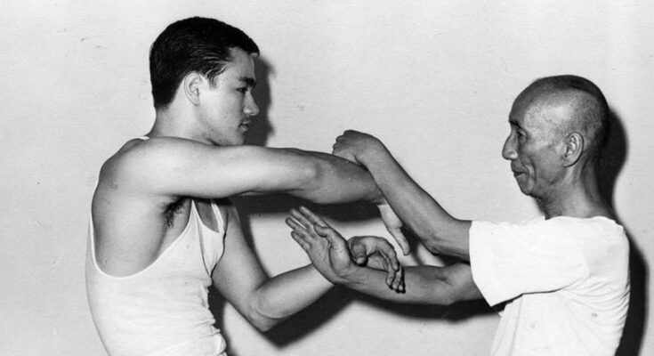 Bruce Lee and Grandmaster Ip Man practicing Wing Tsun sticky hands.